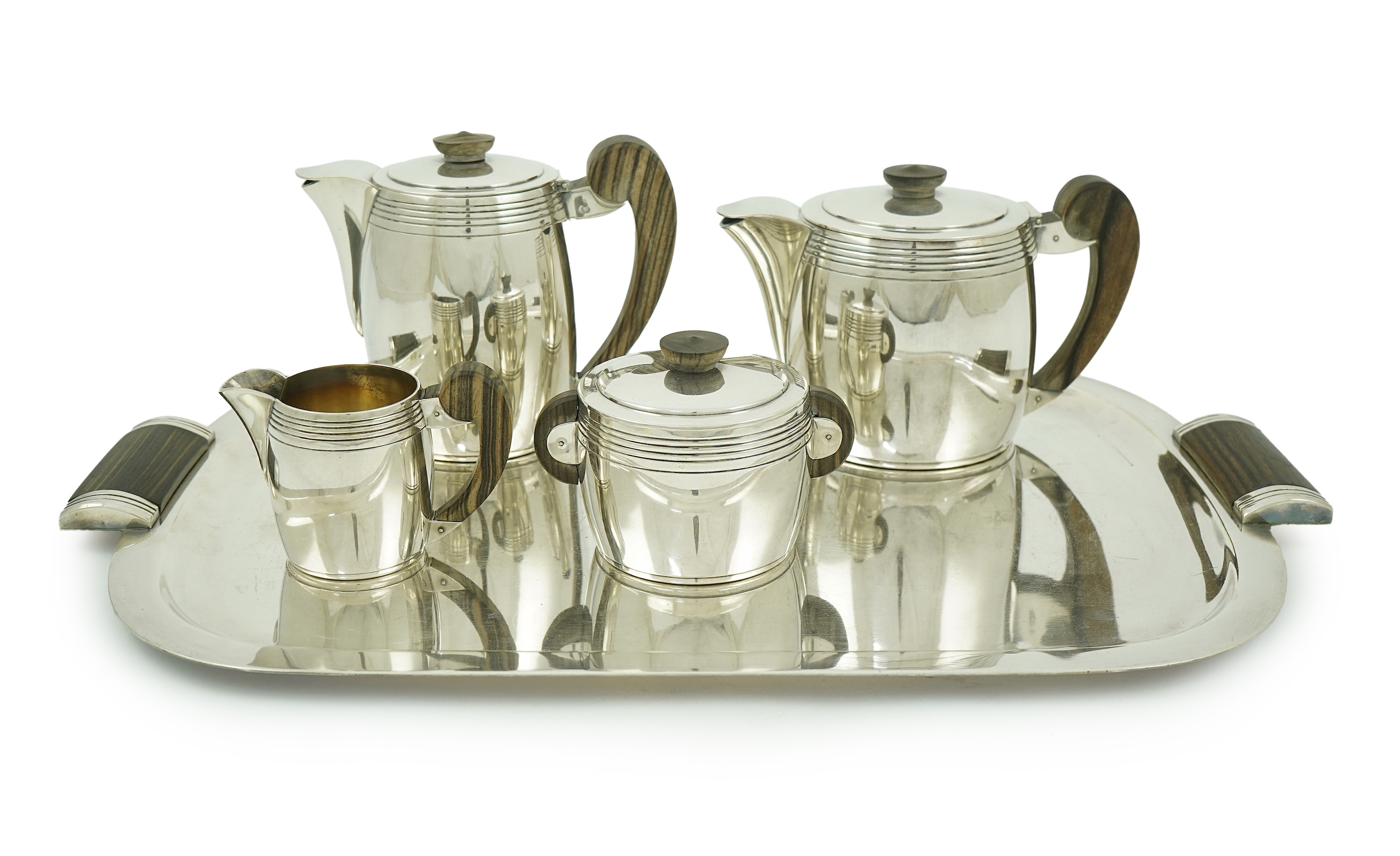 An Ercuis Art Deco silver plated Macassar handled four piece tea or coffee set